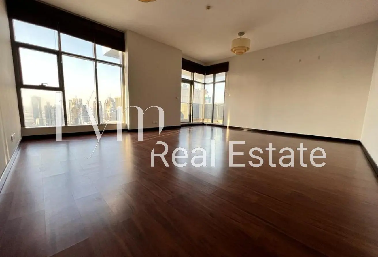 Open-plan living and dining room with floor-to-ceiling windows and Dubai Marina views, Green Lakes S2